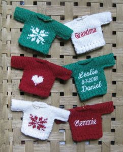 sweater ornaments in a basket