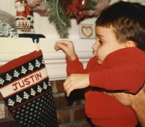 baby with christmas stocking
